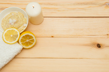 Fototapeta na wymiar Beautiful spa composition with scrub and lemon on table close up