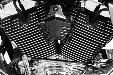 Fototapeta premium Motorbike's chromed engine black and white background