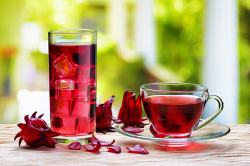 Cup of hot hibiscus tea (red sorrel) and the same cold drink