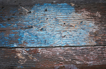 .Old paint on old wood. Background.