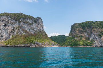 Fototapeta premium Mountain island on the sea blue sky