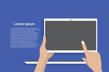 Using modern laptop with detachable screen. Blue background.