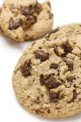 Chocolate chip cookie on white background.