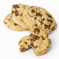 Chocolate chip cookie on white background.