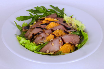 beautiful salad with duck breast pineapple pine nuts and balsamic appetizing food