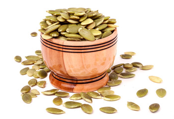 peeled pumpkin seeds in a bowl