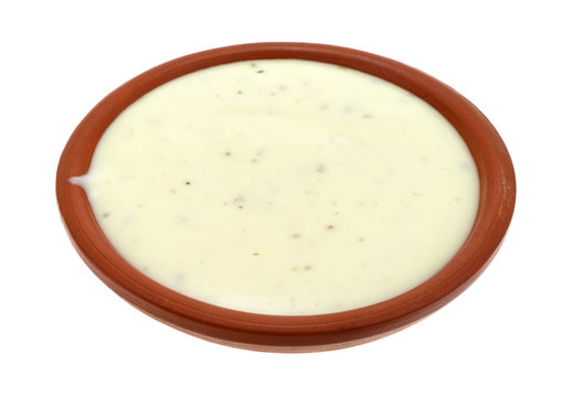 Bowl Of Ranch Dressing On A White Background