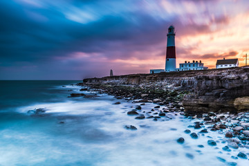 Time lapse of dramatic sunset and Portland Bill lighthouse