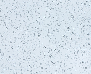 Water bubbles on glass blue background