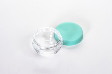 empty cosmetic glass jar isolated on white background