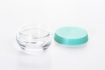 empty cosmetic glass jar isolated on white background