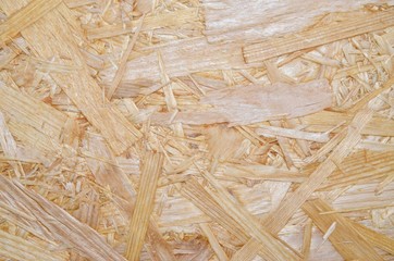 wood texture in the background, OSB boards