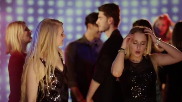 two girls on the dancefloor at club