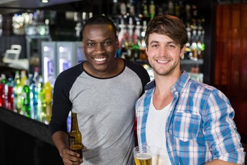Happy friends having a drink