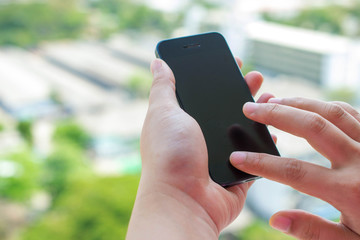 using touch screen mobile hold on hand