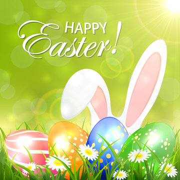 Green background with colored Easter eggs and rabbit