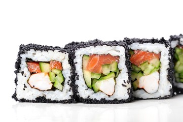 Japan square black tobiko rolls with shrimp, salmon and cucumber