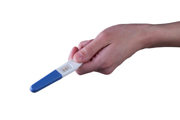Female hand showing positive pregnancy test, expecting a baby