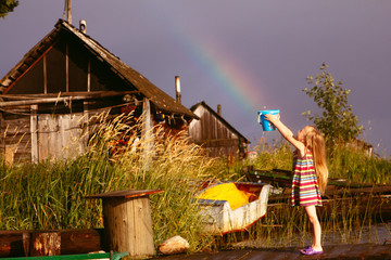little girl is delighted with the rainbow
Маленькая девочка в радужном...