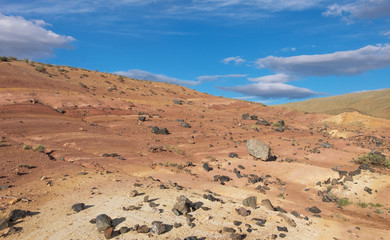 Red earth and blue sky