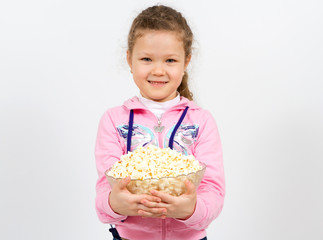 Portrait of a little girl with popcorn