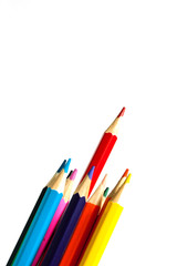 Close up of color pencils with different color over white backgr