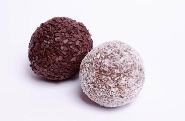 Vegan version of chocolate balls  topped with grated coconut and chocolate 