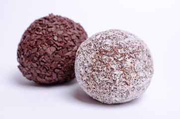 Vegan version of chocolate balls  topped with grated coconut and chocolate 