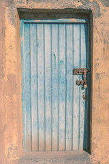 Old vintage wooden door with lock