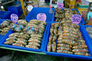 Live black crabs ready to be cooked in fresh market at Thailand.