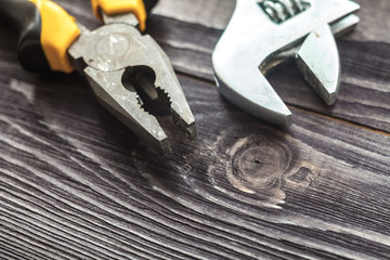 Tools on the wooden rustic background