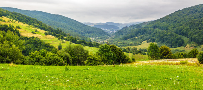 village on hillside meadow