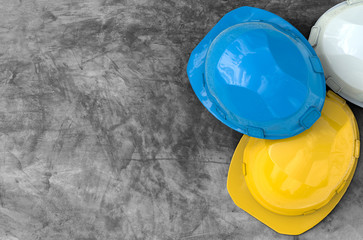 safety helmets on cement background