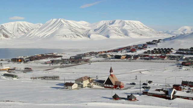 Longyearbyen, Svalbard. Norway. The small town is surrounded by mountains. A Sunny day in March. Timelapse.