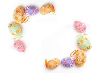 Colorful Easter egg frame against a white background