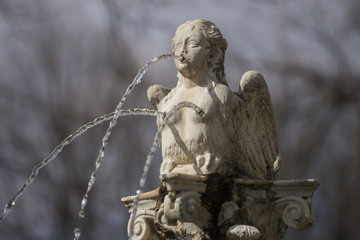 fountain shaped figure angel water jets coming out of breasts an