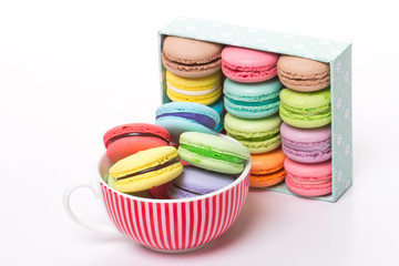 Collection of brightly colored French macarons are in a holiday