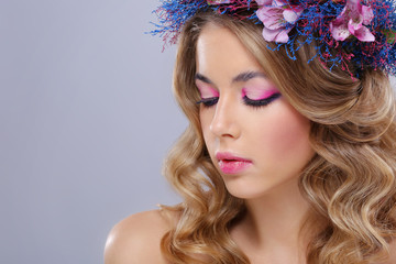 Beautiful young woman in wreath