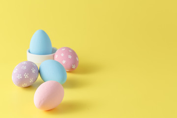 Eastern egg on yellow paper background