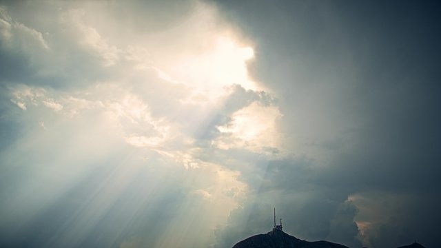 Cloudy weather view of the Lovcen mountain national park in southwestern Montenegro, paning from the sky to the ground.