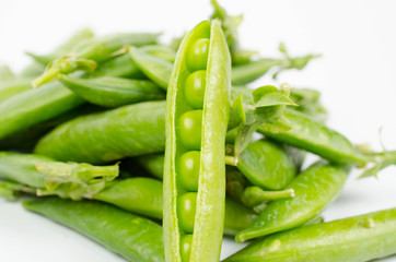 Fresh peas isolated on white background