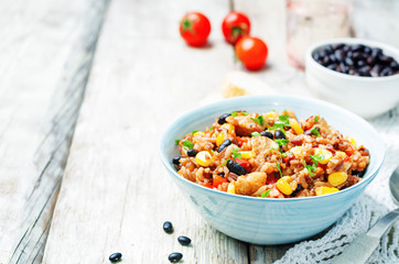 Black beans, corn and tomato red and white rice with chicken