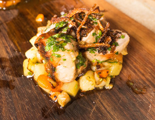 A specialty from meat and potatoes in sauce from Seiser Alm, South Tirol