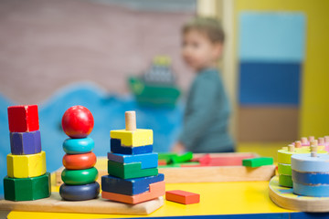 Stacks of colorful wooden blocks and toys