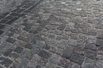 Urban stone paving stones. Backgrounds and textures