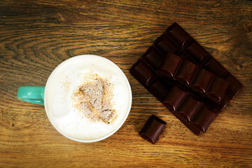 Cup of Coffee with Chocolate  on Dark Background in Retro Vintag