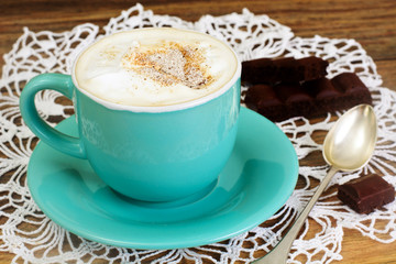 Cup of Coffee with Chocolate  on Dark Background in Retro Vintag