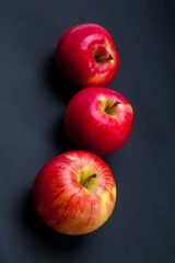 red apple isolated on a black background