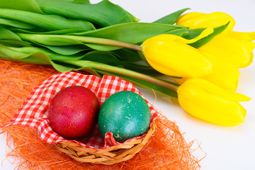 Painted Easter Eggs and Spring Yellow Tulips Flower