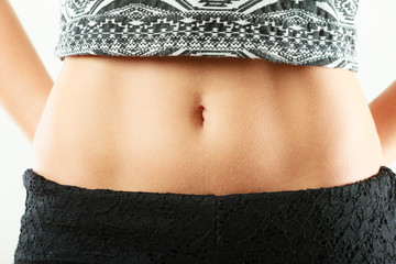 Closeup sexy alluring woman hips and belly.